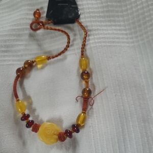 Elegant Yellow and Brown Beaded Bracelet